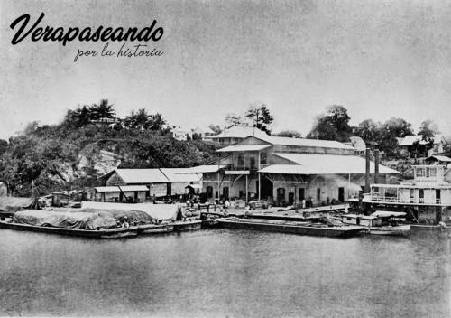 Aduana de Livingston con lanchones para transportar el café y vapor de bajo calado. 1897